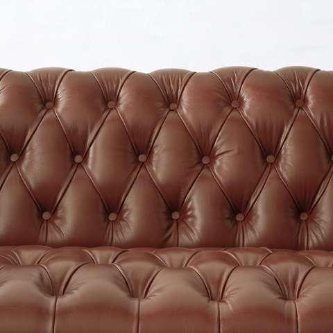 The Maharaja Chesterfield sofa deep diamond button tufting leather detail