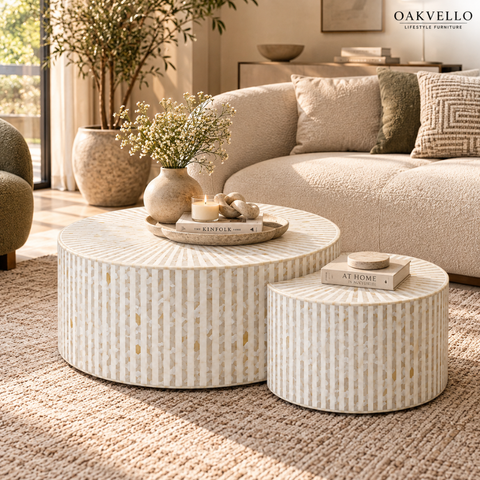 Oakvello round bone inlay nesting coffee table set with two ivory tables in a warm living room